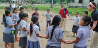 ISLP participants work with students during a previous ISLP trip.