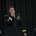 Brig. Gen. Brian J. Mennes composes himself as he begins his keynote speech to graduating cadets, family members and friends at the Army ROTC's Spring 2017 commissioning ceremony. Mennes said as he sat on the airplane to travel to Louisville, several people thanked him for his service, and he felt humbled.