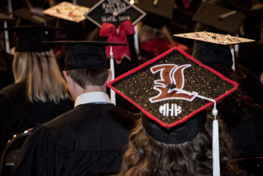 Spring commencement is Saturday at the KFC Yum! Center.