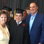 Jeanne and Mark Dant pose with son Ryan Dant at UofL's May 13 commencement.