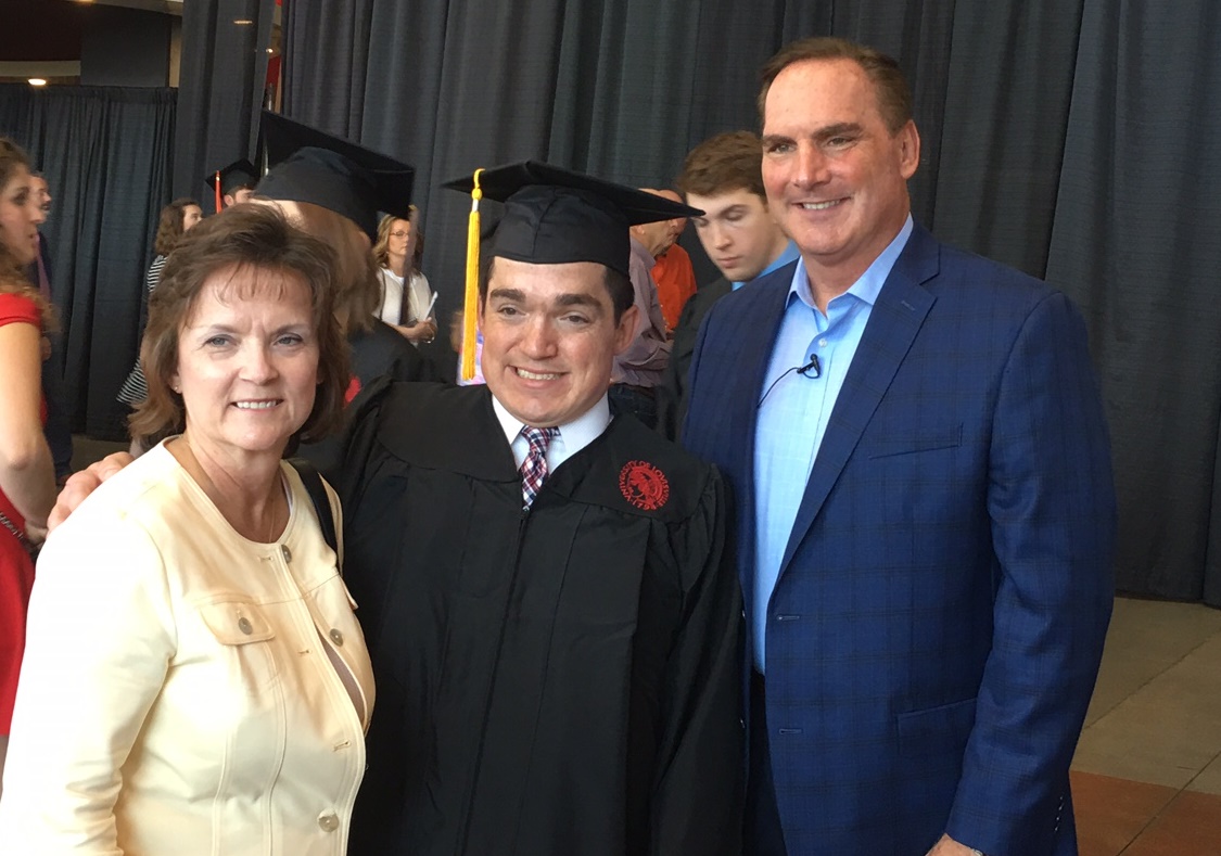 Jeanne and Mark Dant pose with son Ryan Dant at UofL's May 13 commencement.