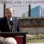 Dr. Greg Postel, UofL's interim president, speaks during today's top off ceremony for the new Pediatric Medical Office Building.