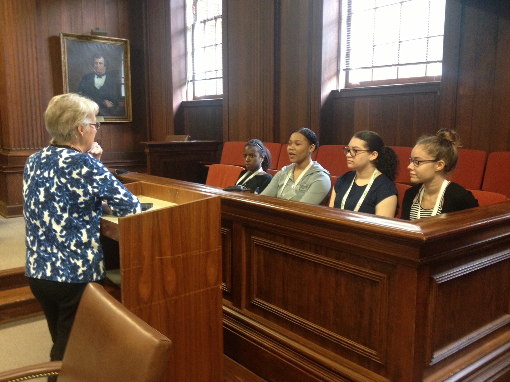 Professor Rothstein speaks with the high school students in the Allen Courtroom. Left to right, they are: Gabrielle Alston, Mahagoni Richardson, Makayla Rankin and Sierra Daniels.