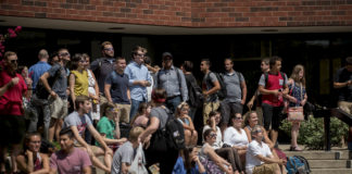 Large pockets of people gathered all over campus Monday to witness the solar eclipse.