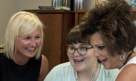 Amy Lingo (left) and Dean Ann Larson (far right) are working closely with Megan Baskerville, an aspiring elementary education teacher.