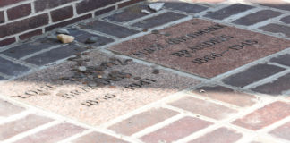 The remains of SCOTUS Justice Louis D. Brandeis and his wife Alice are buried under the portico of the law school that bears his name.