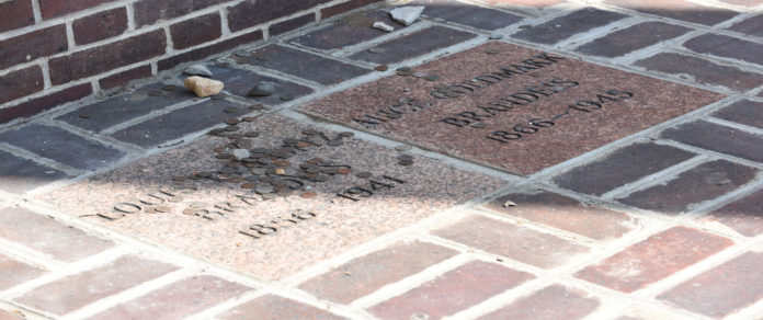 The remains of SCOTUS Justice Louis D. Brandeis and his wife Alice are buried under the portico of the law school that bears his name.