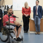 Andrew Meas, a research participant at UofL with a complete spinal cord injury, with members of the resarch team, Claudia Angeli, Susan Harkema and Enrico Rejc,.
