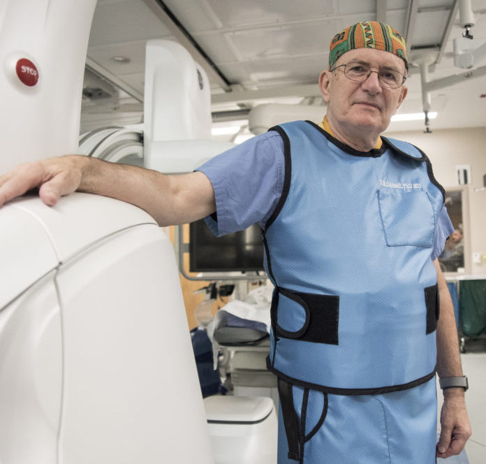 UofL’s Douglas Coldwell, M.D., Ph.D., with the new Discovery IGS 740 system at University of Louisville Hospital