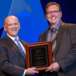 Kristopher K. Rau, Ph.D., receives the Next Generation award from Eric Nestler, M.D., Ph.D., 2016-17 president of the national Society for Neuroscience.