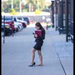 Student wearing one shoe.