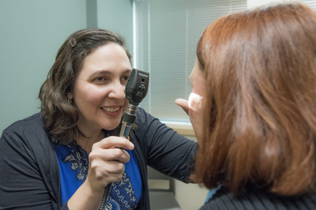 Dr. Luz Fernandez and patient at UofL Physicians -Family Medicine Cardinal Station