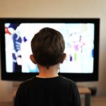 child watching television