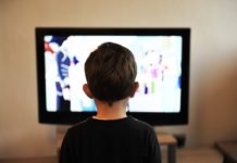 child watching television