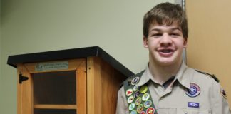 Michael Siebert donated two Little Free Libraries to waiting rooms at UofL Hospital as part of an Eagle Scout project.