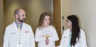 UofL medical student Michael Parsons, Lee Specialty Clinic patient Whitney Foster and Priya Chandan, M.D., M.P.H.