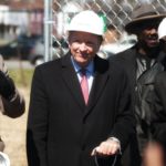 Interim president Greg Postel speaks during Passport Health Plan's groundbreaking ceremony. UofL will lease space in the new building in west Louisville.