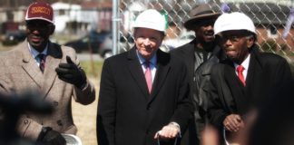 Interim president Greg Postel speaks during Passport Health Plan's groundbreaking ceremony. UofL will lease space in the new building in west Louisville.