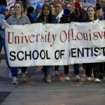 Dozens of students and employees marched Wednesday as part of the annual Take Back the Night rally.