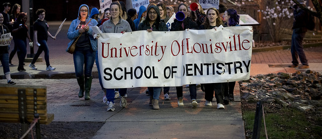 Dozens of students and employees marched Wednesday as part of the annual Take Back the Night rally.