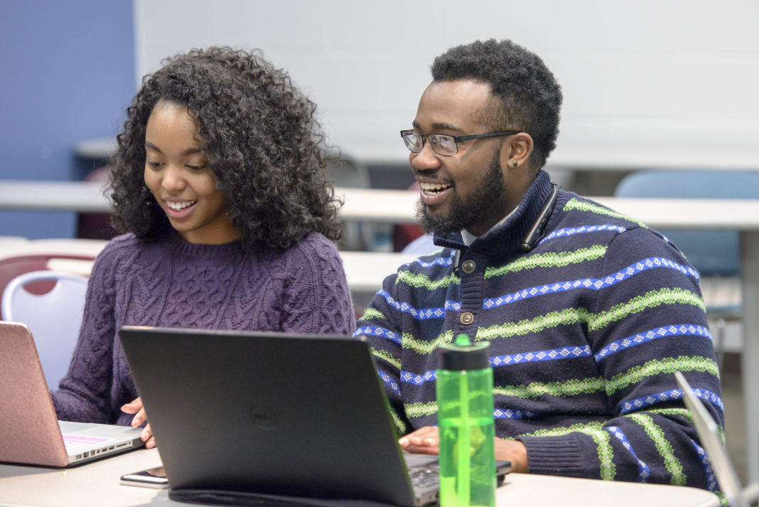 Students in class at the School of Public Health and Information Sciences