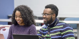 Students in class at the School of Public Health and Information Sciences