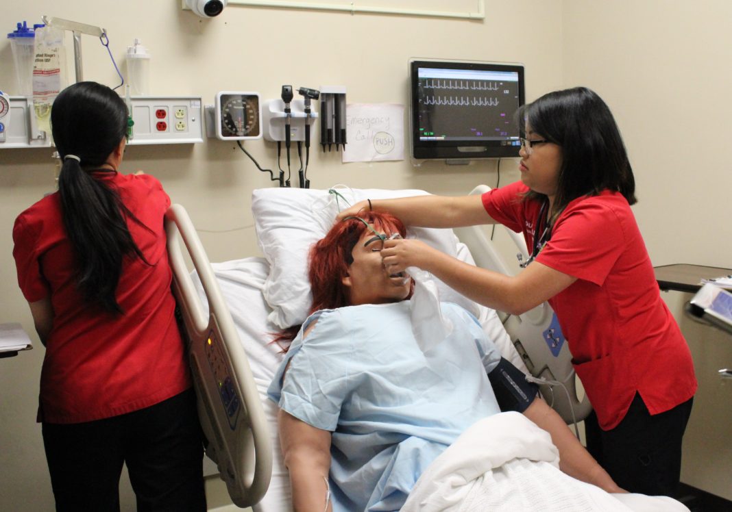 BSN students clinical simulation UofL School of Nursing undergraduate students participate in a clinical simulation.