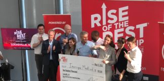 Maggie Galloway (center front, in the tan blazer), CEO of Inscope Medical Solutions, collects her prize from AOL co-founder Steve Case (to Galloway’s left) after winning the Rise of the Rest pitch competition at the UofL Speed Art Museum.