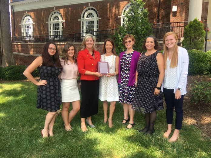 Employees from UofL's health and wellness team, from left, Julia Mackenzie-Rollinson, Tamara Iacono, Patricia Benson, Paula Kommor, Mary Corbett, Ketia Zuckschwerdt, Margaret Geraghty.