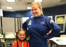 Six-year-old Olivia Belicove, who wants to be an astronaut, bonded this summer with Brenna Ausbrooks, who led Space Adventure Camp at Gheens Science Hall and Rauch Planetarium.