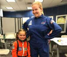 Six-year-old Olivia Belicove, who wants to be an astronaut, bonded this summer with Brenna Ausbrooks, who led Space Adventure Camp at Gheens Science Hall and Rauch Planetarium.