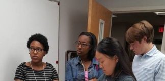 SHPEP participants Jalajaa Slaton, Sydney Johnson, Caroline Xiong and Noah Clements in the UofL School of Medicine simulation center