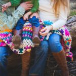 Parents holding a child