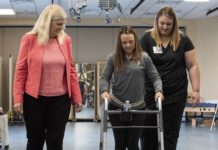 Susan Harkema, Ph.D., left, with research participant Kelly Thomas and Katie Pfost