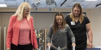 Susan Harkema, Ph.D., left, with research participant Kelly Thomas and Katie Pfost