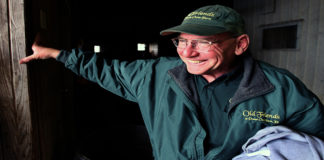 Micheal Blowen founder of Old Friends, a retirement facility for thoroughbred horses, waits for his friend, jockey Chris McCarron at his riding academy in Lexington, Ky. Photo by Stan Rosenfeld