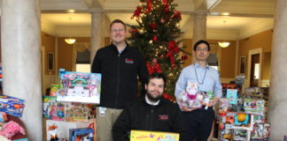 The UofL House Staff Council collected 870 gifts during its Toys for Tots campaign this month. Resident physicians pictured are (from left) Jamie Morris, M.D., Jared Winston, M.D., and Taro Muso, M.D.