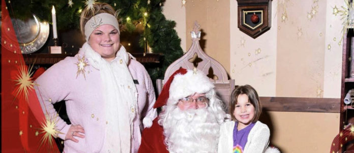 Amanda Lee and Kailyn, pictured with Santa Claus.