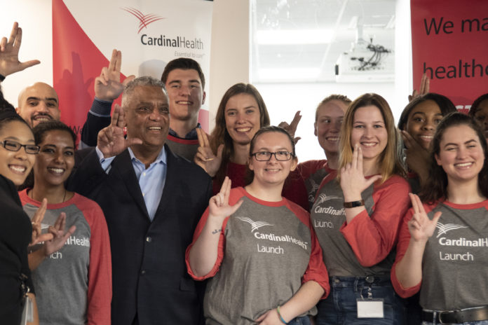UofL / Cardinal Health Launch event Launch associates throw up the