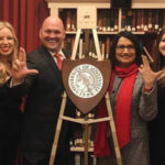 Members of UofL's SGA were on hand, along with President Neeli Bendapudi, to unveil UofL's crest at the prestigious University Club in Washington, DC.