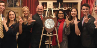 Members of UofL's SGA were on hand, along with President Neeli Bendapudi, to unveil UofL's crest at the prestigious University Club in Washington, DC.