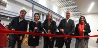 Gill Holland, Metro Councilwoman Barbara Sexton Smith, Dean Kimberly Kempf-Leonard, Mayor Greg Fischer and President Neeli Bendapudi prepare to cut the ribbon for renovated Portland space.