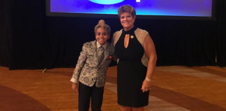 Meg Peavy poses with one of her Rising Star students at the WLKY Bell Awards in 2018.