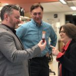 UofL's Marty O'Toole, Qualigen CEO Michael Poirier and UofL's Paula Bates in a lab.