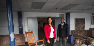 Kent School faculty Emma Sterrett-Hong and Maurice Gattis stand in a room of the soon-to-be opened Sweet Evening Breeze homeless shelter for LGBT youth.