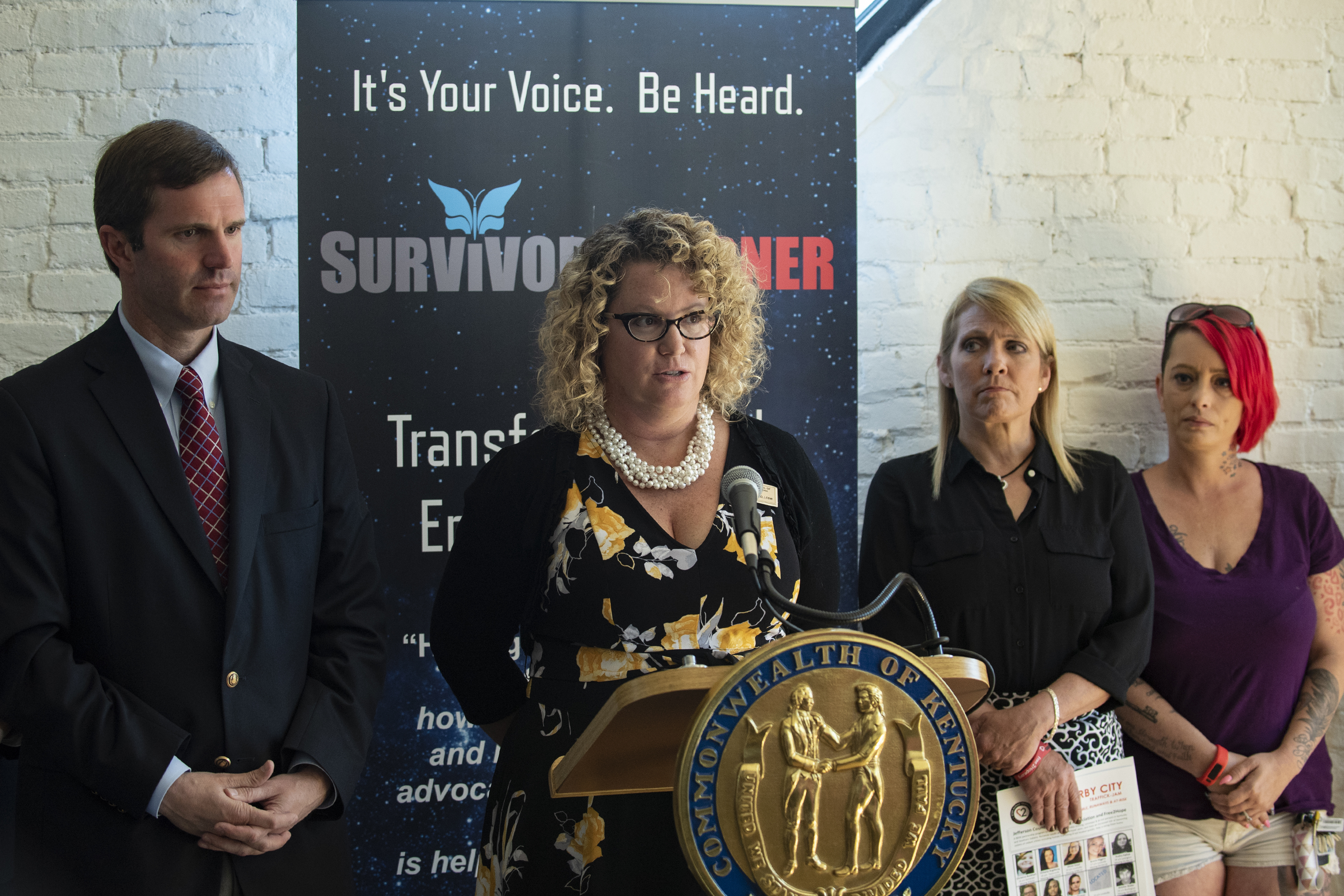 Kent School of Social Work associate professor Jennifer Middleton speaks at a human trafficking awareness announcement with Kentucky Attorney General Andy Beshear, Free2Hope founder Amy Leenerts and Women of the Well founder Summer Dickerson.