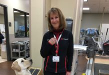 Travis, UofL Hospital facility dog with Cathy Gerrish