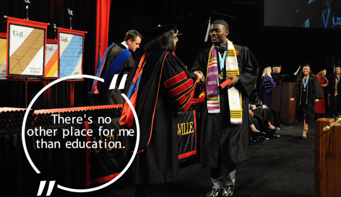 Tre'Von Watts receiving his UofL diploma