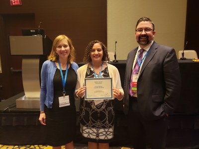 Carmen Mitchell, center, a doctoral student in the Department of Health Management & Systems Sciences, was selected as the winner of the AcademyHealth Disparities Interest Group’s first student op-ed contest.