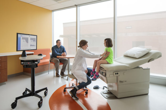 A patient is examined at the Novak Center for Children’s Health, which houses UofL Pediatrics – Downtown.